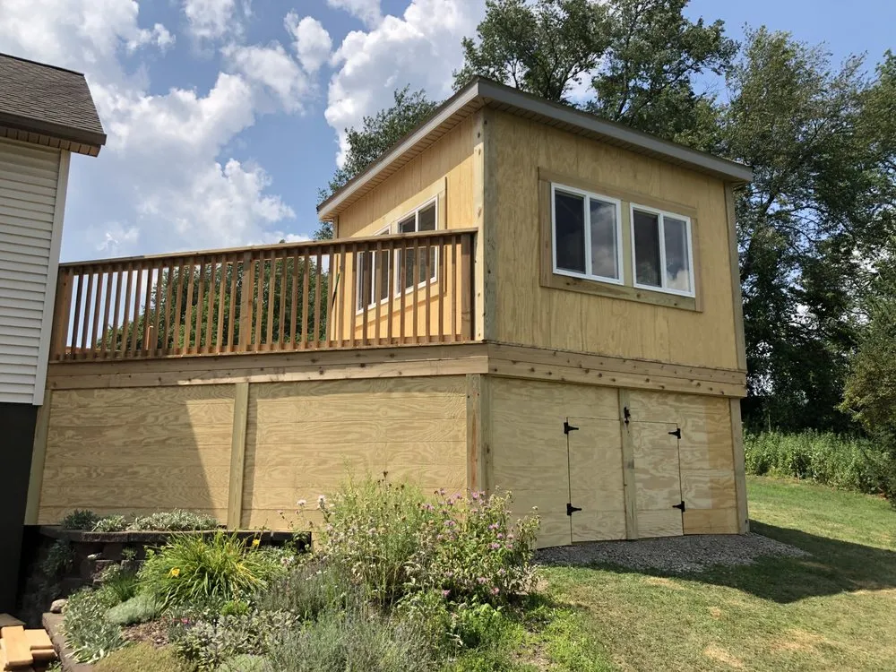 Affordable landscape design for homes in Cooperstown, NY by Hade Hollow Construction