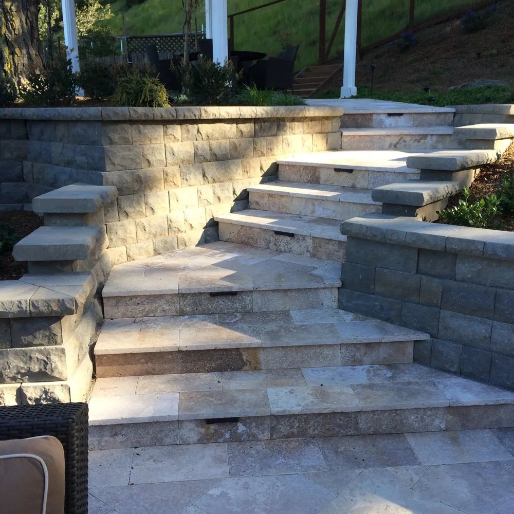 Professional lawn mowing service for residential properties in Belmont, CA by Hallmark Fine Gardens