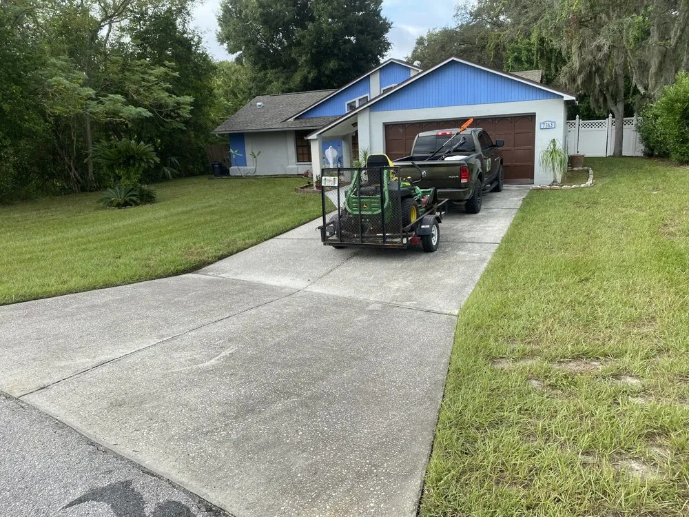 Local yard maintenance with custom design in Spring Hill, FL by Hall’s Complete Lawn Care