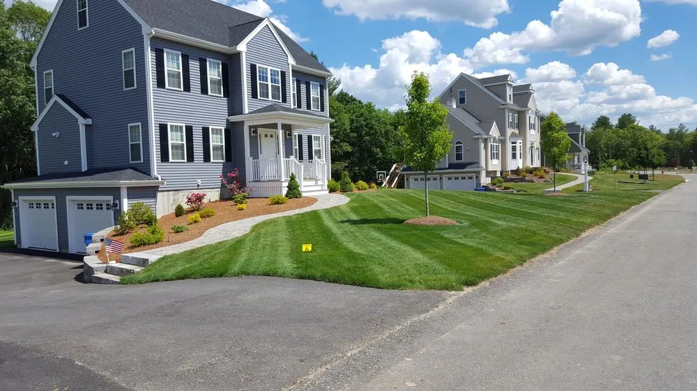 Local landscape design for year-round maintenance in Brockton, MA by Halls Landscaping