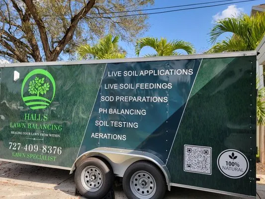 Hall's Lawn Balancing Logo