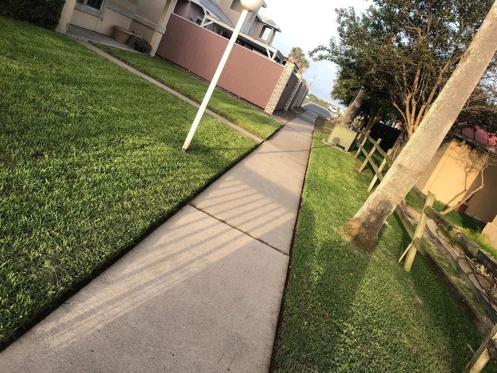 Custom landscape design in Rockport, TX by Hampton Lawn Care