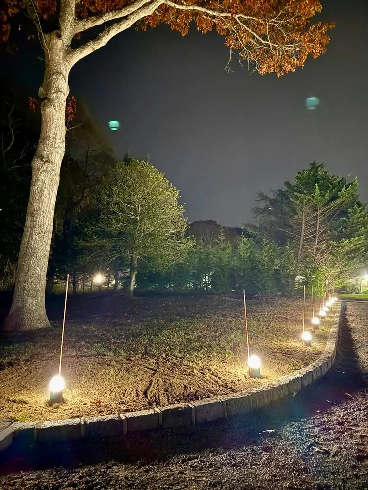 Custom landscape installation in East Quogue, NY by Hamptons Night Path