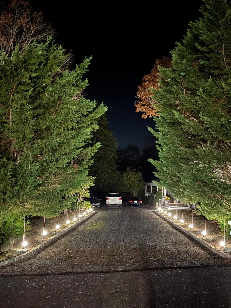 Custom landscape installation for homes in East Quogue, NY by Hamptons Night Path