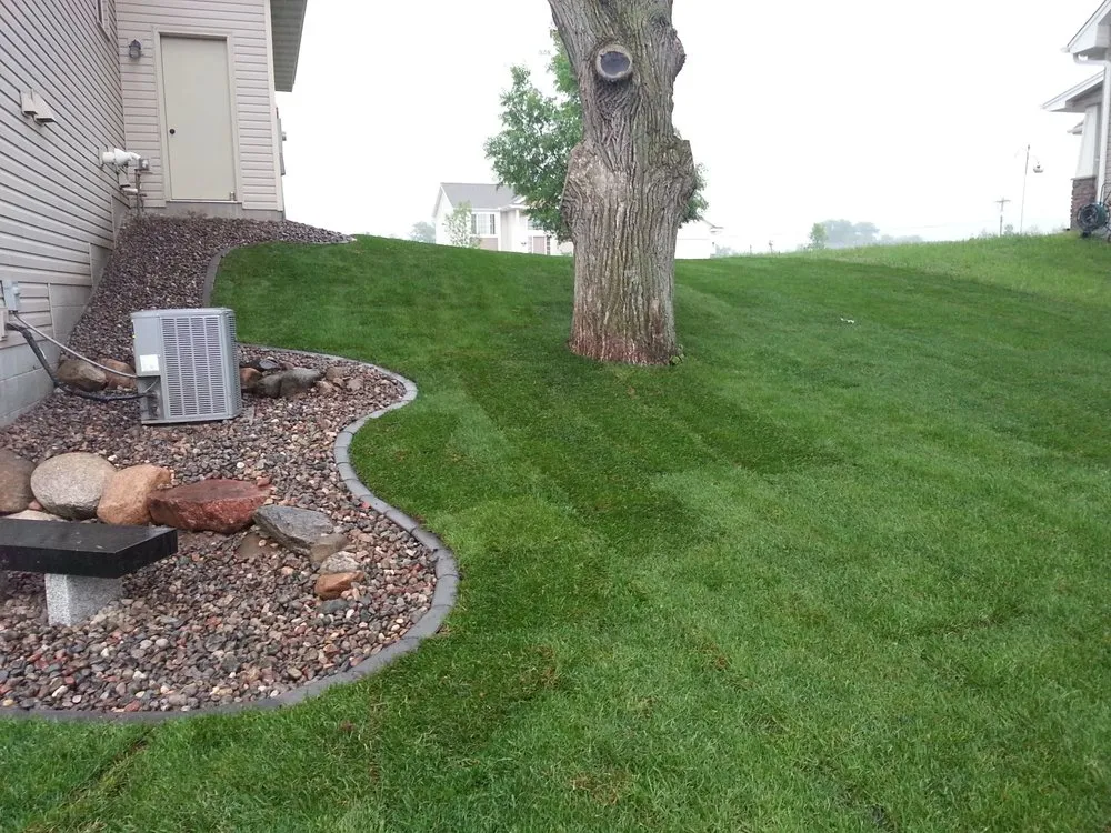 Professional landscaping services with custom design in Lake Elmo, MN by Handemann Property Services
