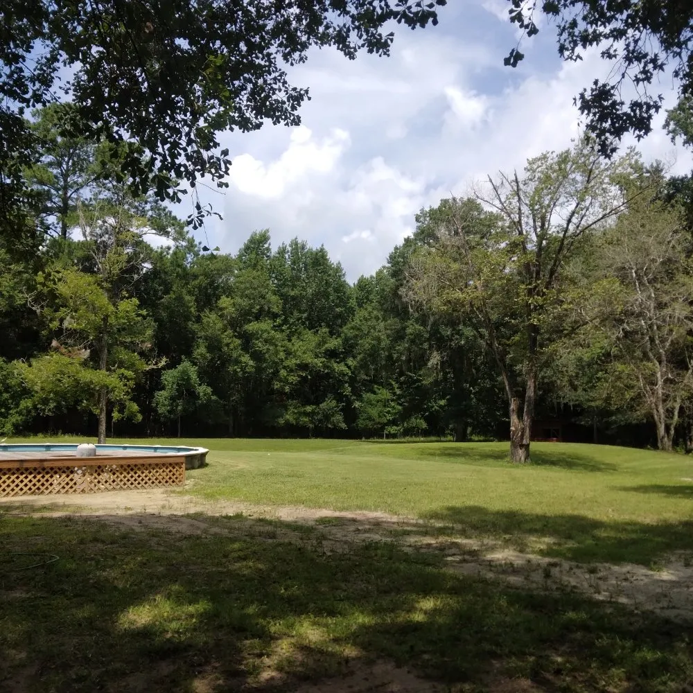 Affordable lawn mowing service for year-round maintenance in Hilliard, FL by Handley's Services