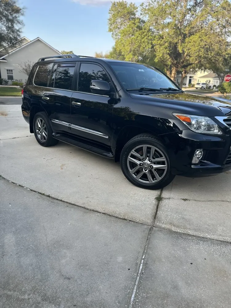 Professional lawn mowing service in Jacksonville, FL by Hands On