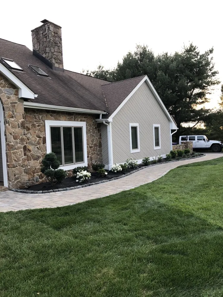 Expert lawn mowing service experts serving Newark, DE - Handshake Construction