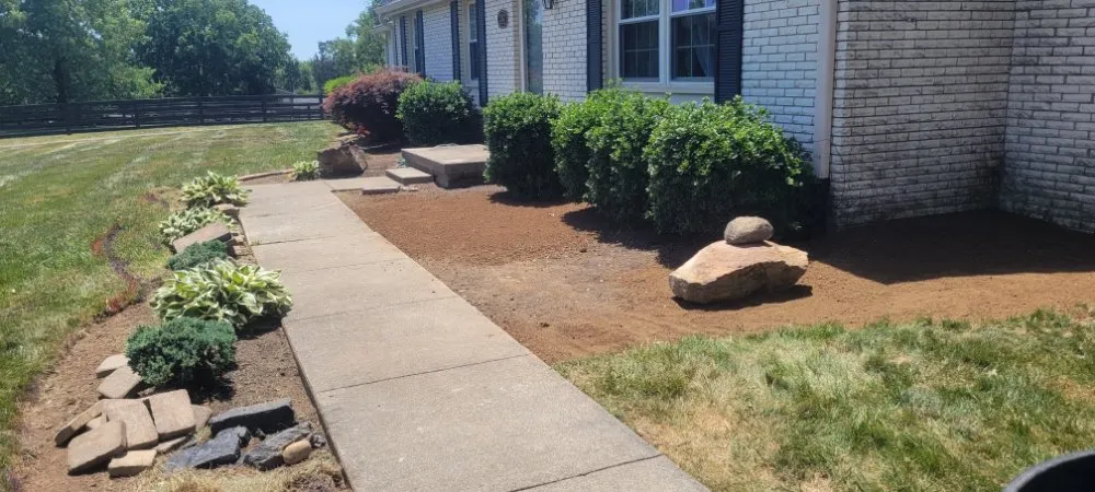 Trusted lawn mowing service experts serving Versailles, KY - Handy Dudes