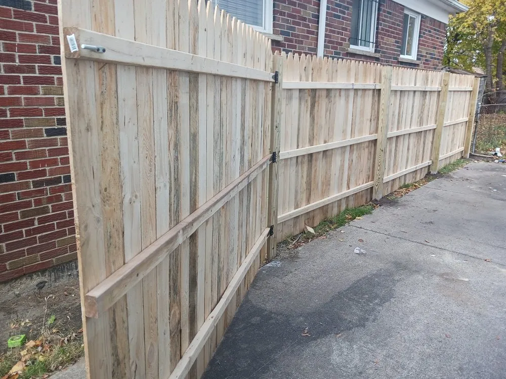 Affordable yard maintenance in Detroit, MI by Handy Family