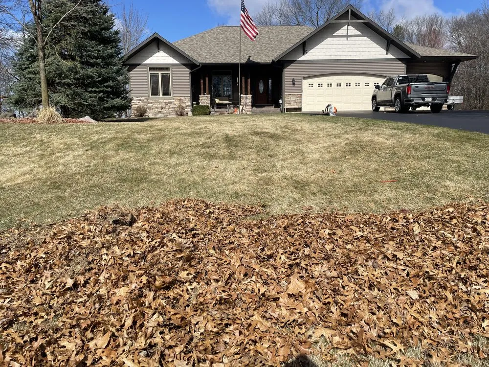 Affordable lawn care service in Eau Claire, WI by Handy House Helpers