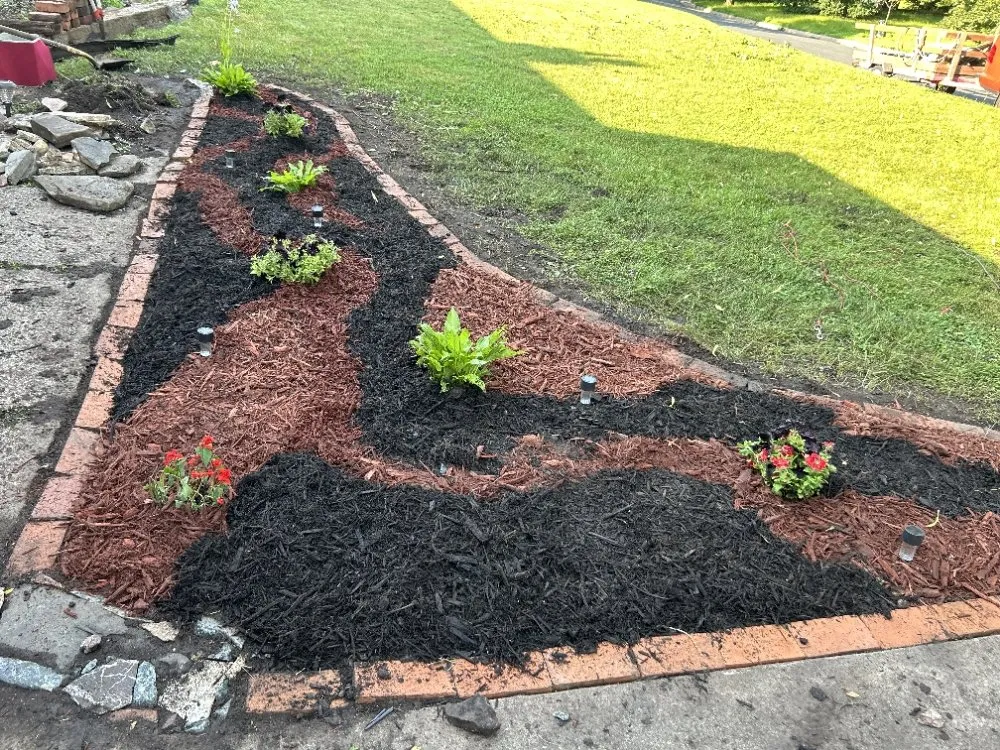 Custom outdoor landscaping in St. Louis Park, MN by Handy Housewife's Hauling