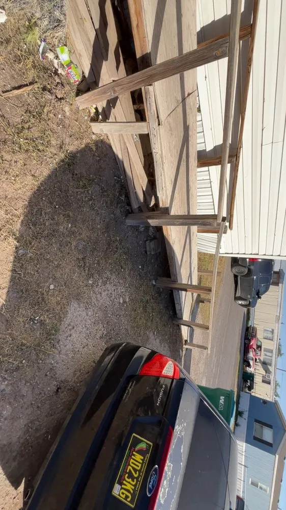 Custom lawn mowing service with custom design in Hobbs, NM by Handy Izzy