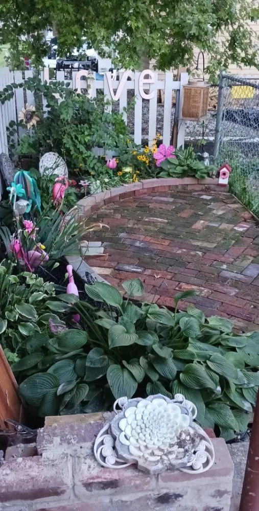 Affordable lawn care service in Anderson, IN by Handygals