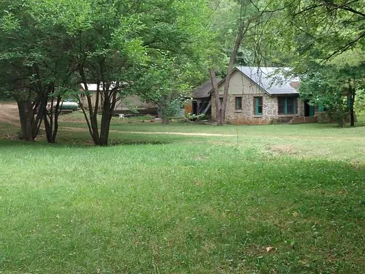 Handyman Dans Lawn Service Logo