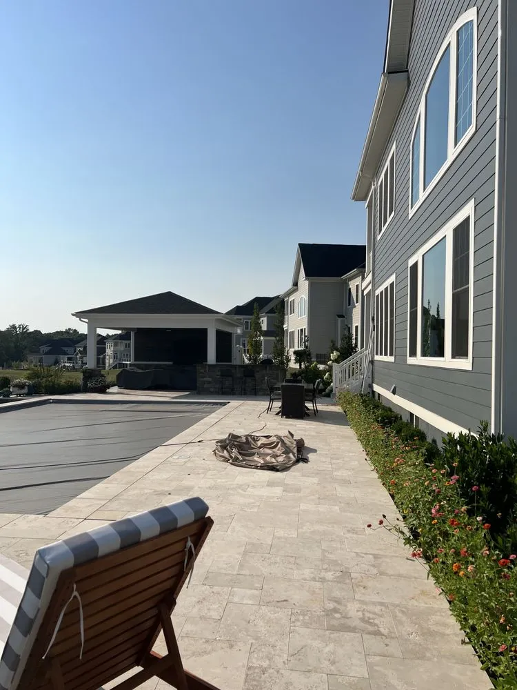 Trusted lawn mowing service for residential properties in Midland, VA by Hanover Landscapes & Masonry