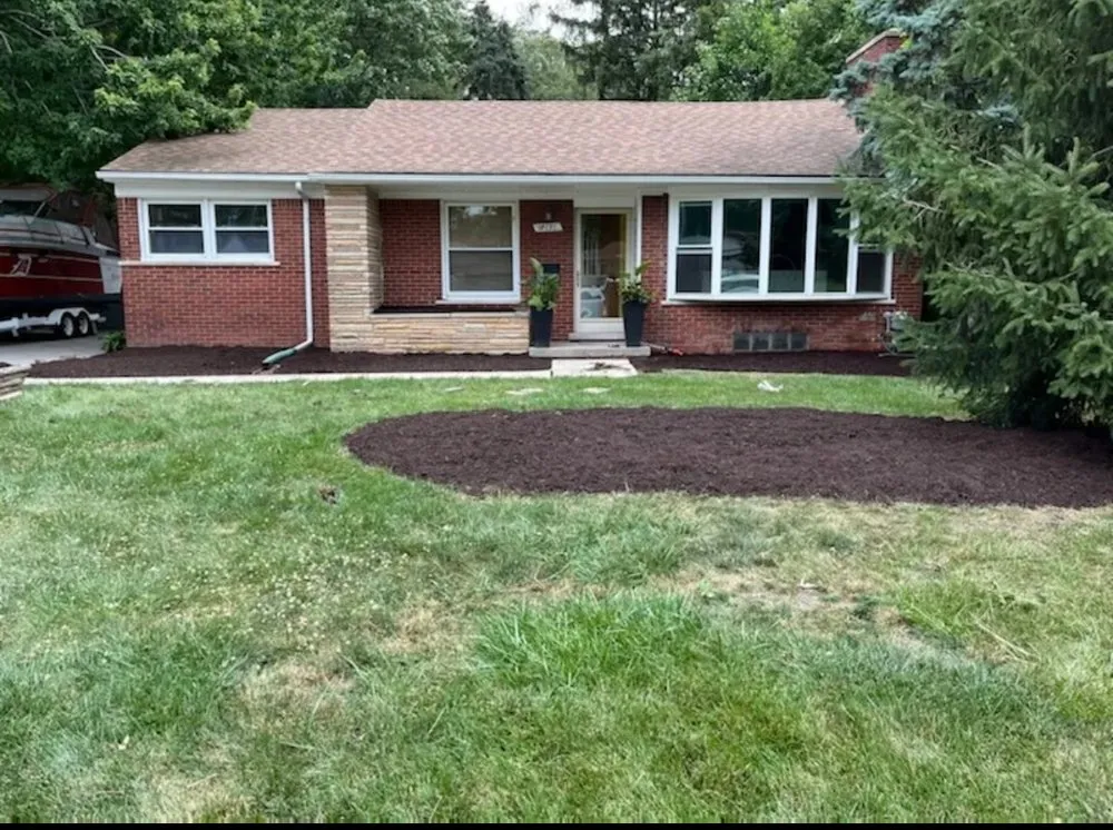 Affordable landscape design for year-round maintenance in Detroit, MI by Happy Cuts Lawncare