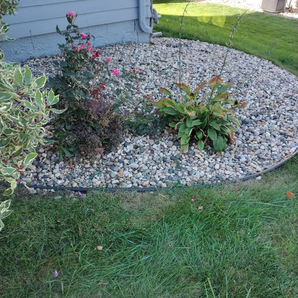 Expert lawn care service experts serving Sioux Falls, SD - Happy Hands Yard Service