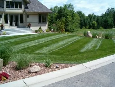 Affordable yard cleanup service for year-round maintenance across Gladwin, MI - Happy Lawn