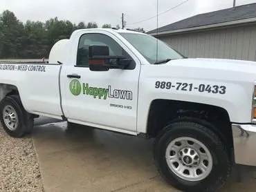 Expert lawn care service in Gladwin, MI by Happy Lawn