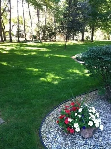 Affordable residential landscaping in Gladwin, MI by Happy Lawn