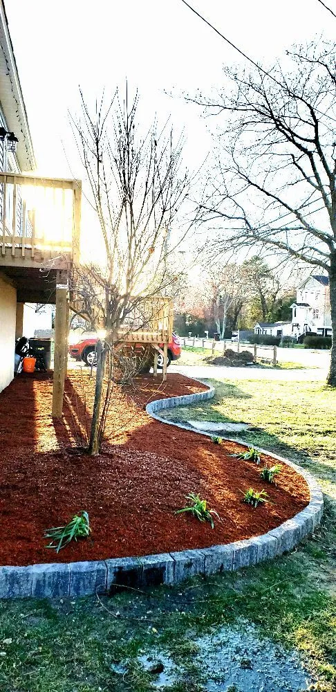 Trusted yard maintenance for year-round maintenance in Bayville, NJ by Happy wife Happy Life Landscaping