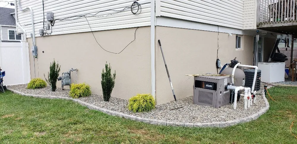 Custom landscape installation with custom design in Bayville, NJ by Happy wife Happy Life Landscaping