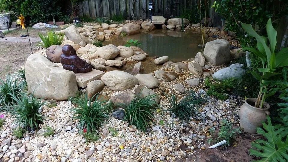 Professional lawn care service for residential properties in Pensacola, FL by Harbor Bay Landscaping