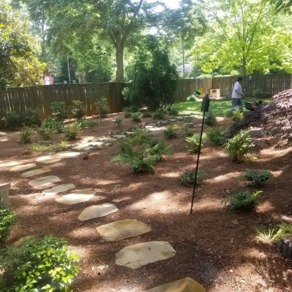 Reliable lawn care service for year-round maintenance in Roswell, GA by Hard-Pro Landscaping