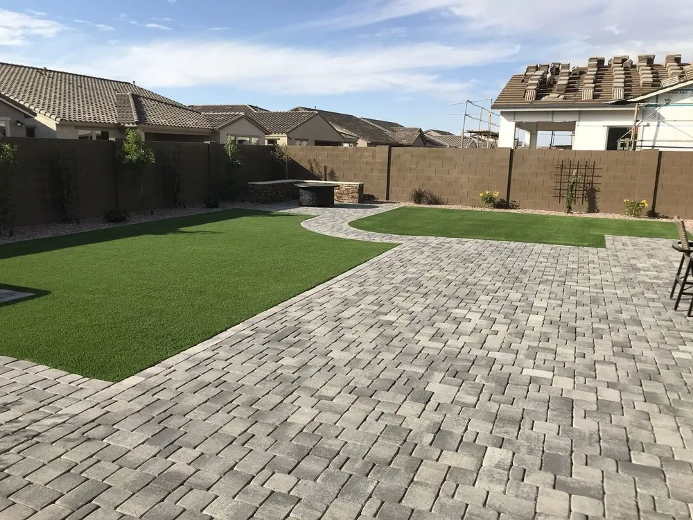 Affordable lawn mowing service for year-round maintenance in Modesto, CA by Hard Rock & Turf Landscape