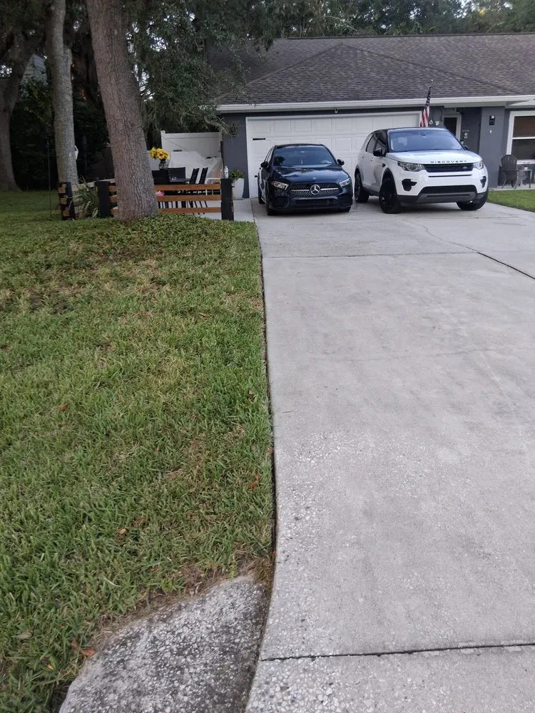 Professional lawn care service for homes in Fernandina Beach, FL by Hard Workin Bee Landscaping