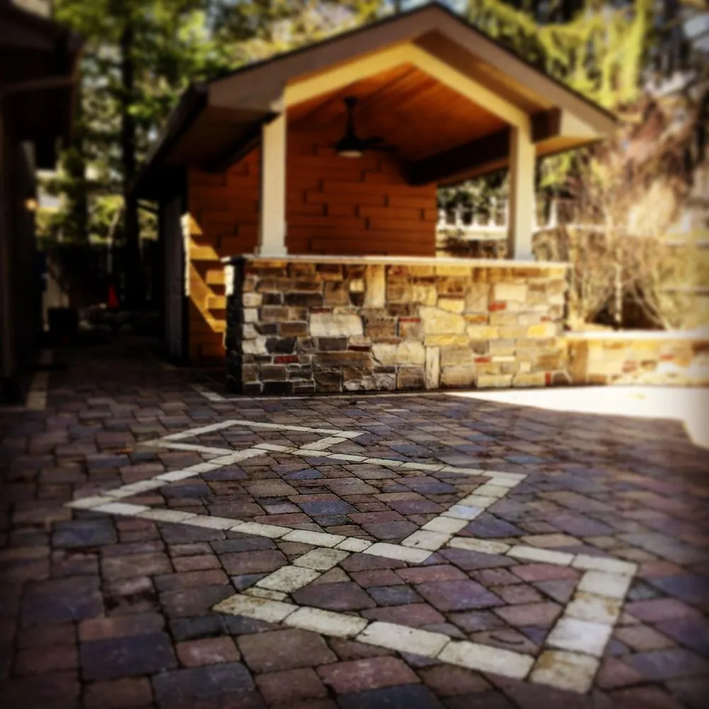 Professional yard maintenance for year-round maintenance across Caledonia, MI - Harder & Warner