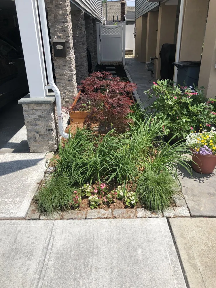 Custom garden landscaping in Hempstead, NY by Harder Tree and Landscape Service