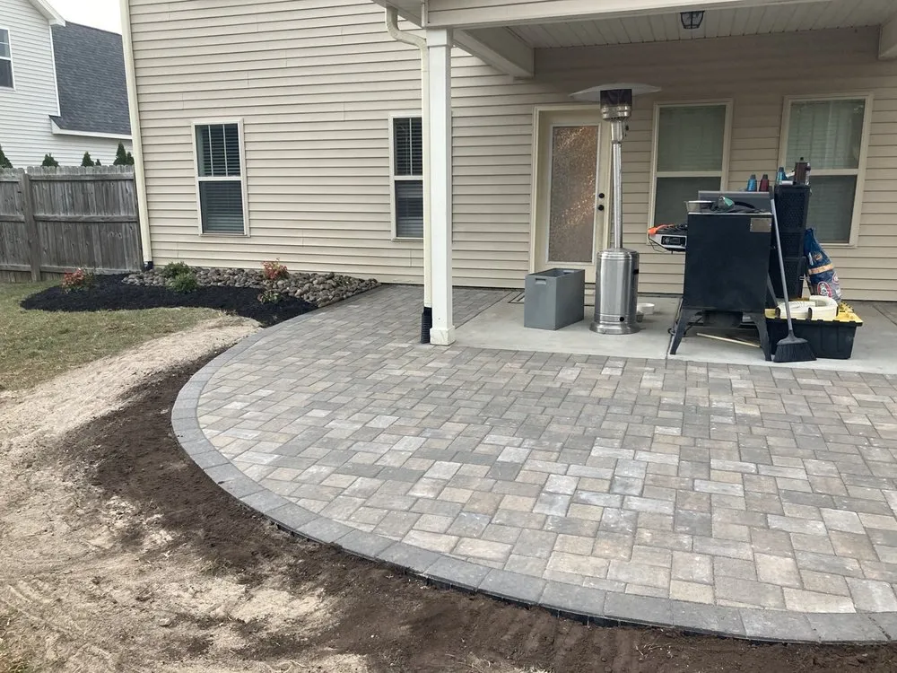 Expert yard maintenance for year-round maintenance across Jacksonville, NC - Hardscape & Landscape By Design