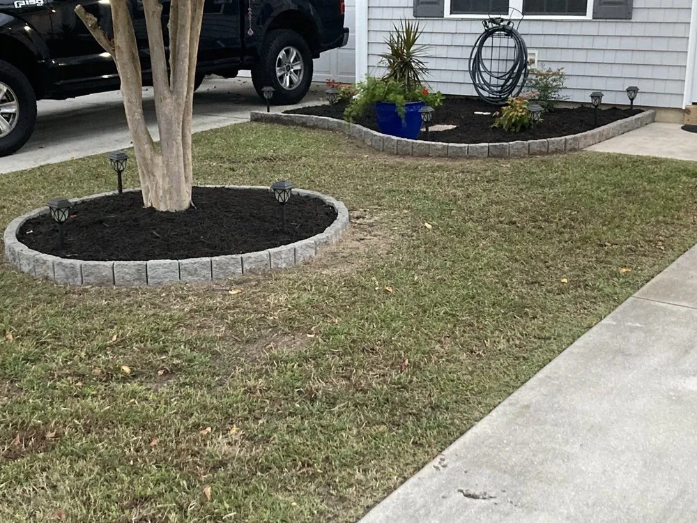 Reliable lawn mowing service for residential properties across Jacksonville, NC - Hardscape & Landscape By Design