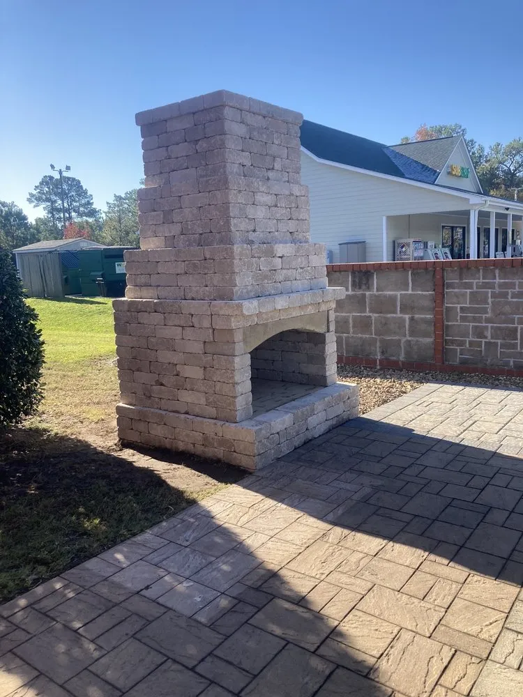 Custom yard maintenance with custom design across Jacksonville, NC - Hardscape & Landscape By Design