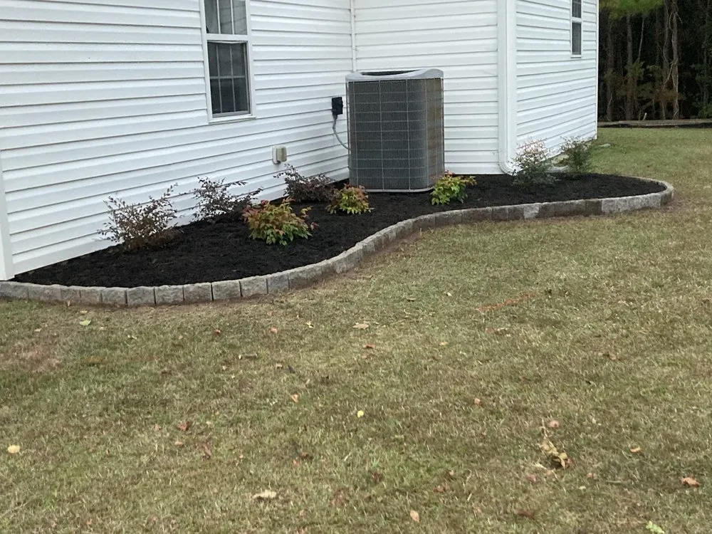 Professional yard cleanup service for beautiful yards across Jacksonville, NC - Hardscape & Landscape By Design