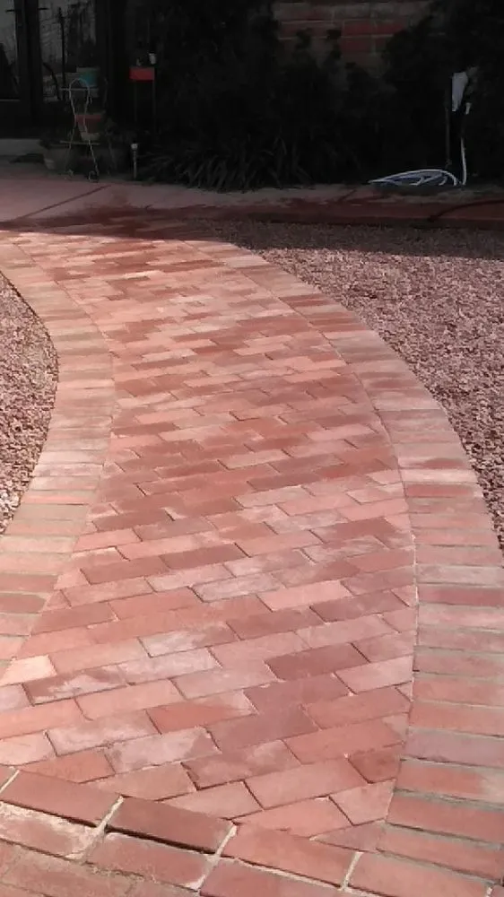 Trusted lawn mowing service with custom design in Tucson, AZ by Hardscape Masonry And Landscaping