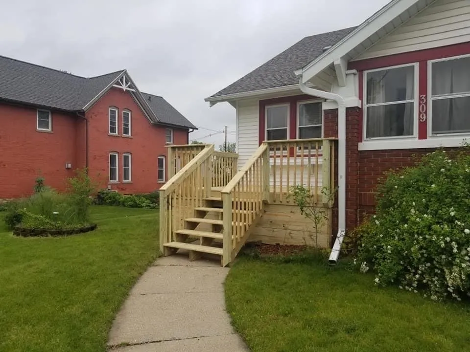 Professional yard maintenance in Marshalltown, IA by Hardscapes & More