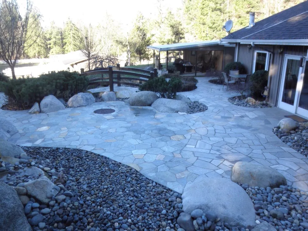 Expert lawn mowing service for year-round maintenance in Sammamish, WA by Hardscapes By Design