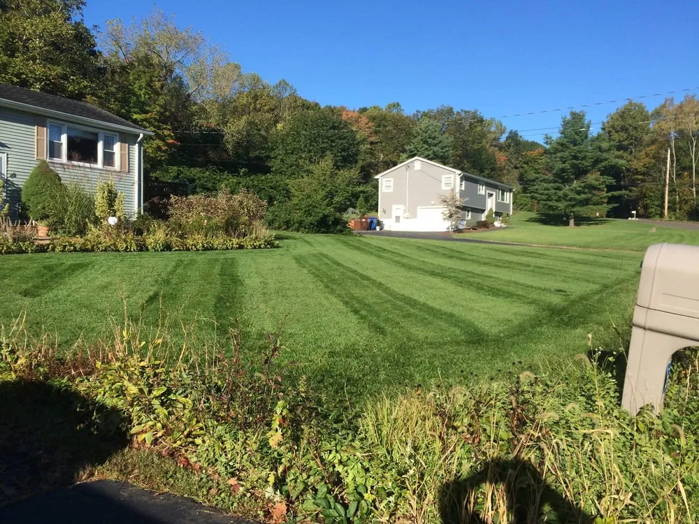 Custom landscaping services for residential properties in Wallingford, CT by Hardscapes Landscaping