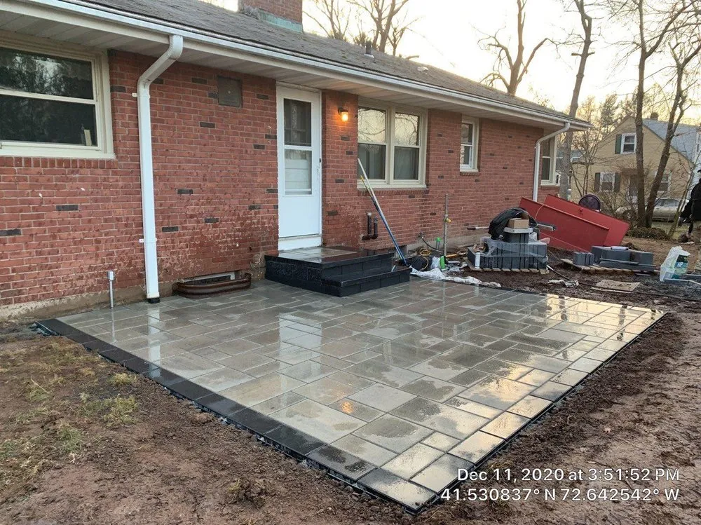 Custom landscape design for homes in Wallingford, CT by Hardscapes Landscaping