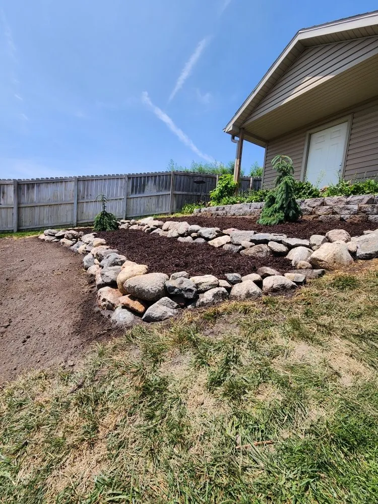 Professional yard cleanup service for beautiful yards across Columbus, NE - Hardscapes Plus