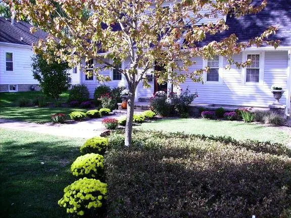 Custom lawn care service for residential properties across Gilman, IL - Harkins Unique Landscapes