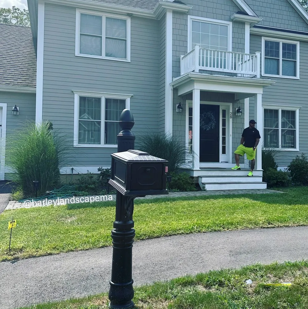 Professional yard cleanup service for residential properties in Rockland, MA by Harley Landscaping