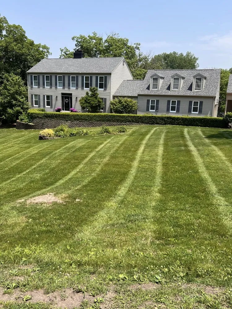 Affordable landscaping services for beautiful yards across Runnells, IA - Harney Lawn Care