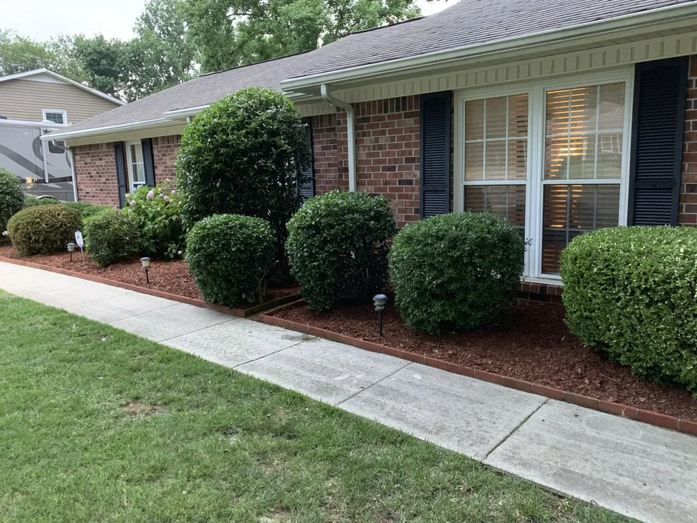 Affordable landscape installation for year-round maintenance in Huntsville, AL by Harrell Lawn Care Services