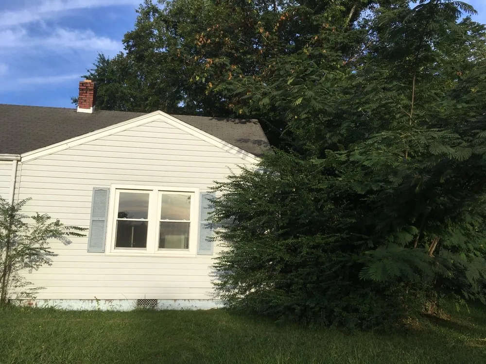 Professional yard cleanup service for homes in Fayetteville, NC by Harris & Harris Lawncare