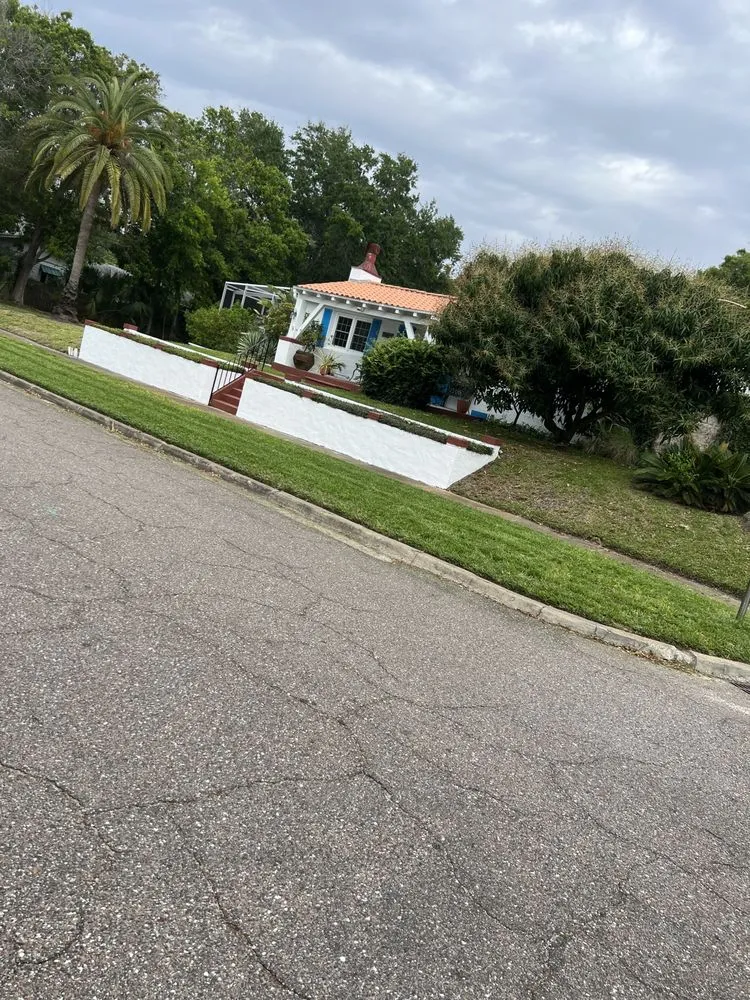 Reliable landscape design in Tampa Bay, FL by Harris and Grandosn  Lawncare