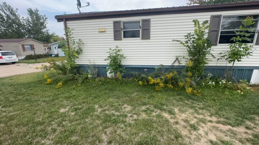 Custom residential landscaping for year-round maintenance in Hiawatha, IA by Harris Cleaning Service